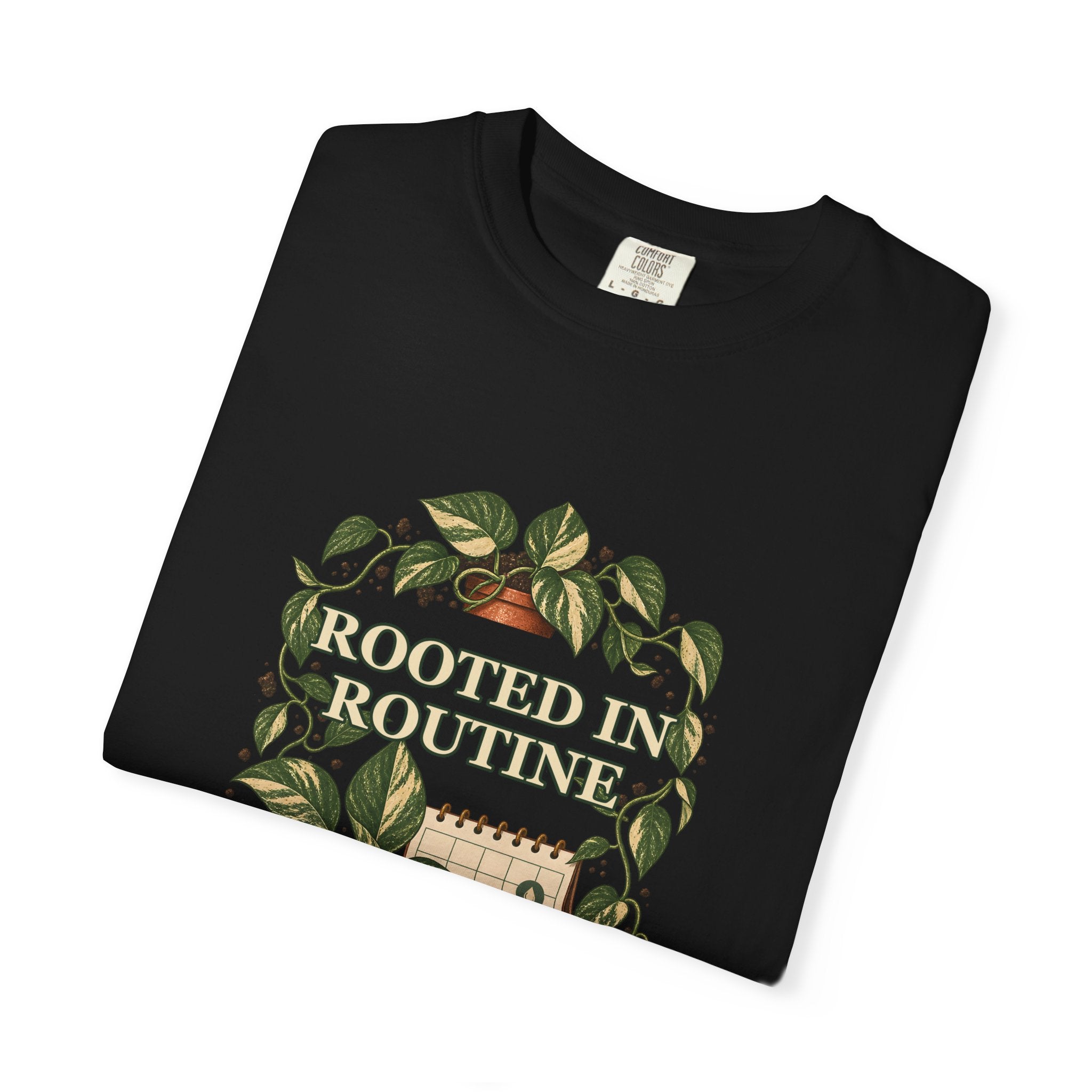 Rooted in Routine botanical plant-care design on a Comfort Colors garment-dyed T-shirt